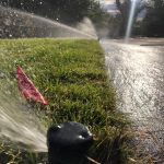 Close up of an operational sprinkler head